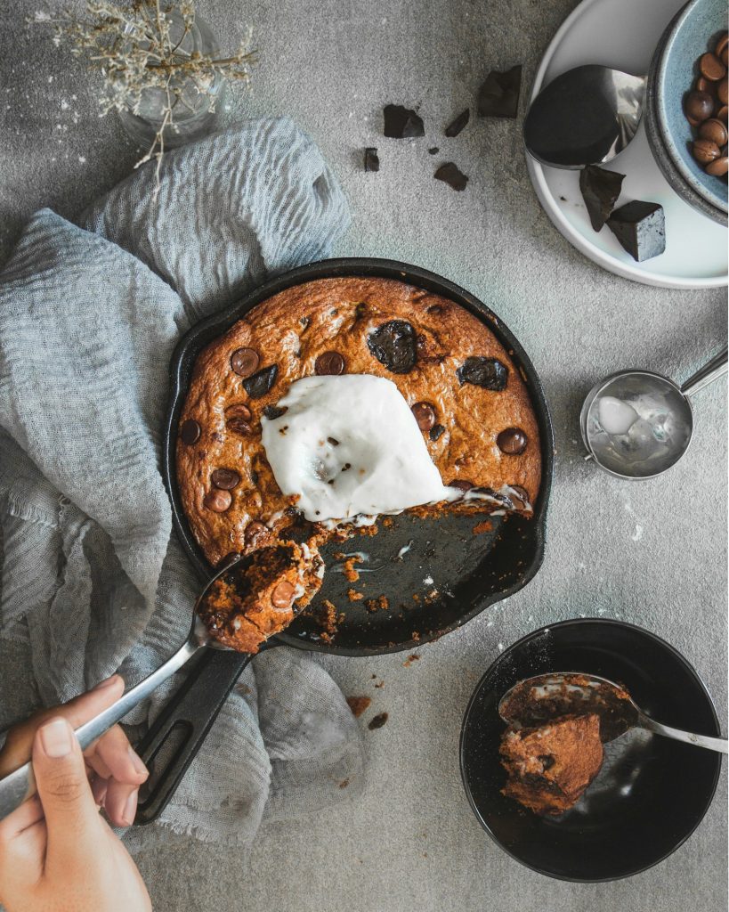 Brown butter chocolate chip skillet cookie in a cast iron pan